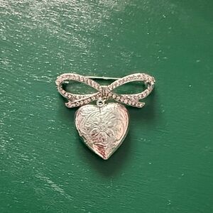 Elegant Silver Tone Heart Brooch Locket with Bow